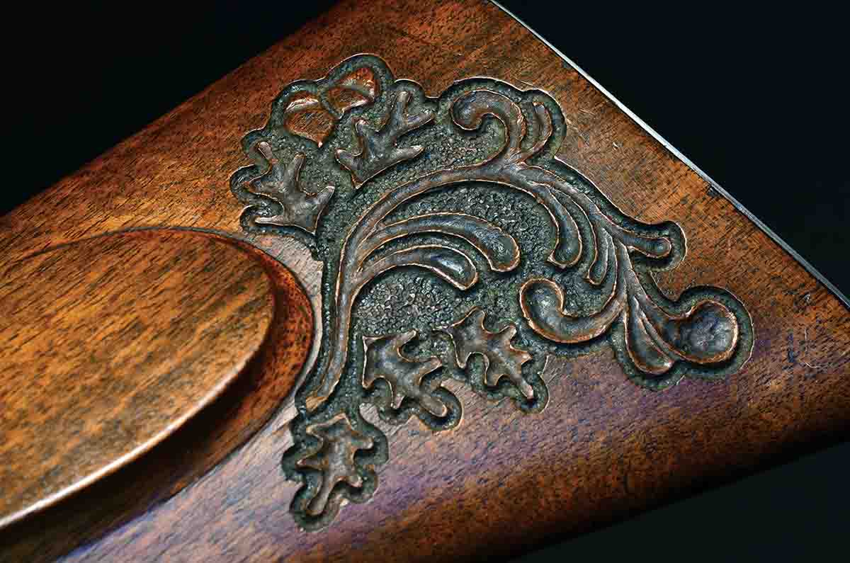 Carving on the left side of the stock is also very nicely done – again, with oak leaves.